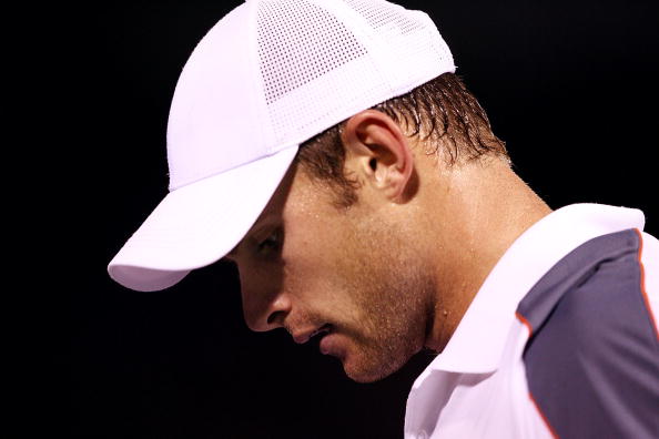 打网球是戴的运动帽哪种好